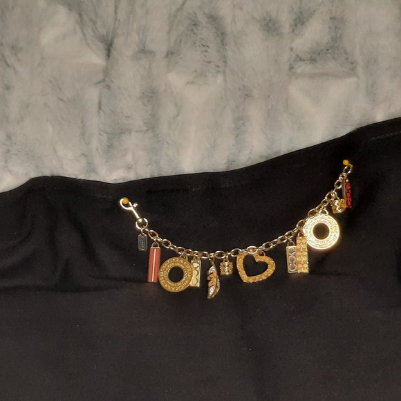 Coach multi charm bracelet - Picture 1 of 3